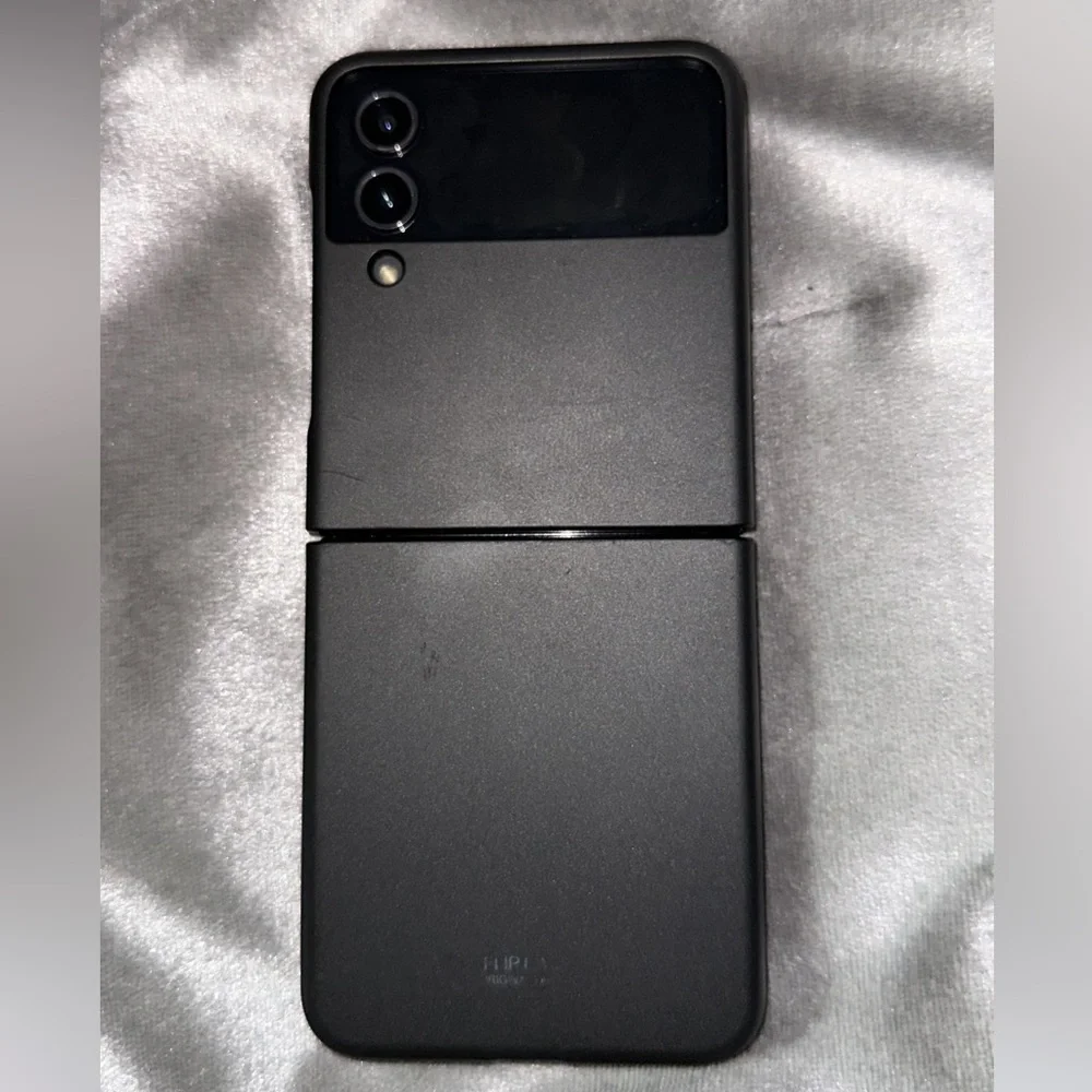 Black Foldable Smartphone with Blue Display